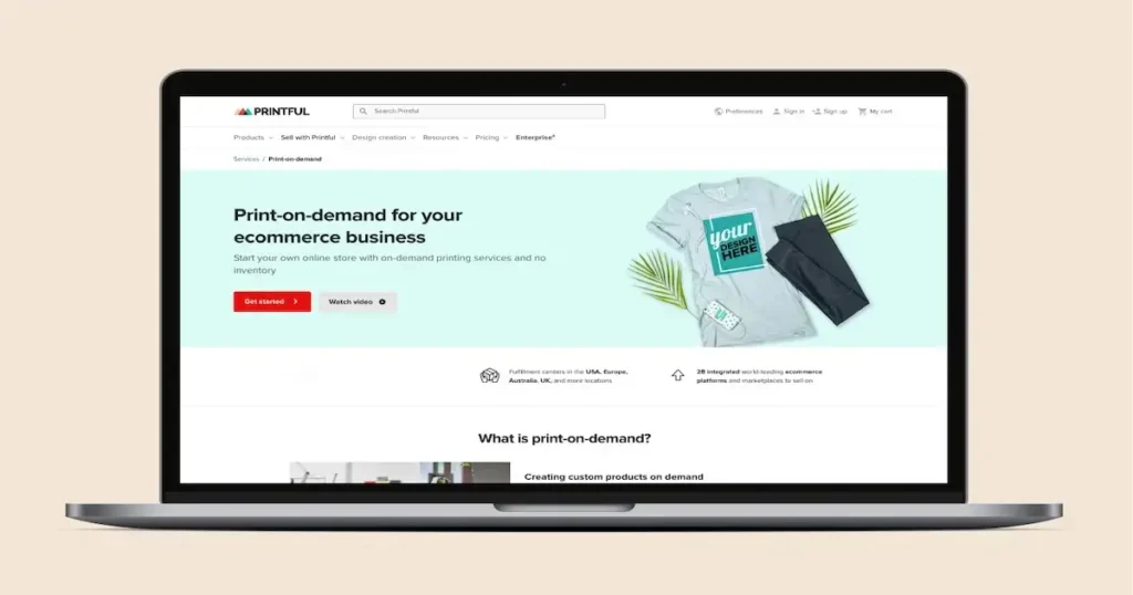Laptop mockup displaying the Printful print-on-demand homepage for ecommerce stores